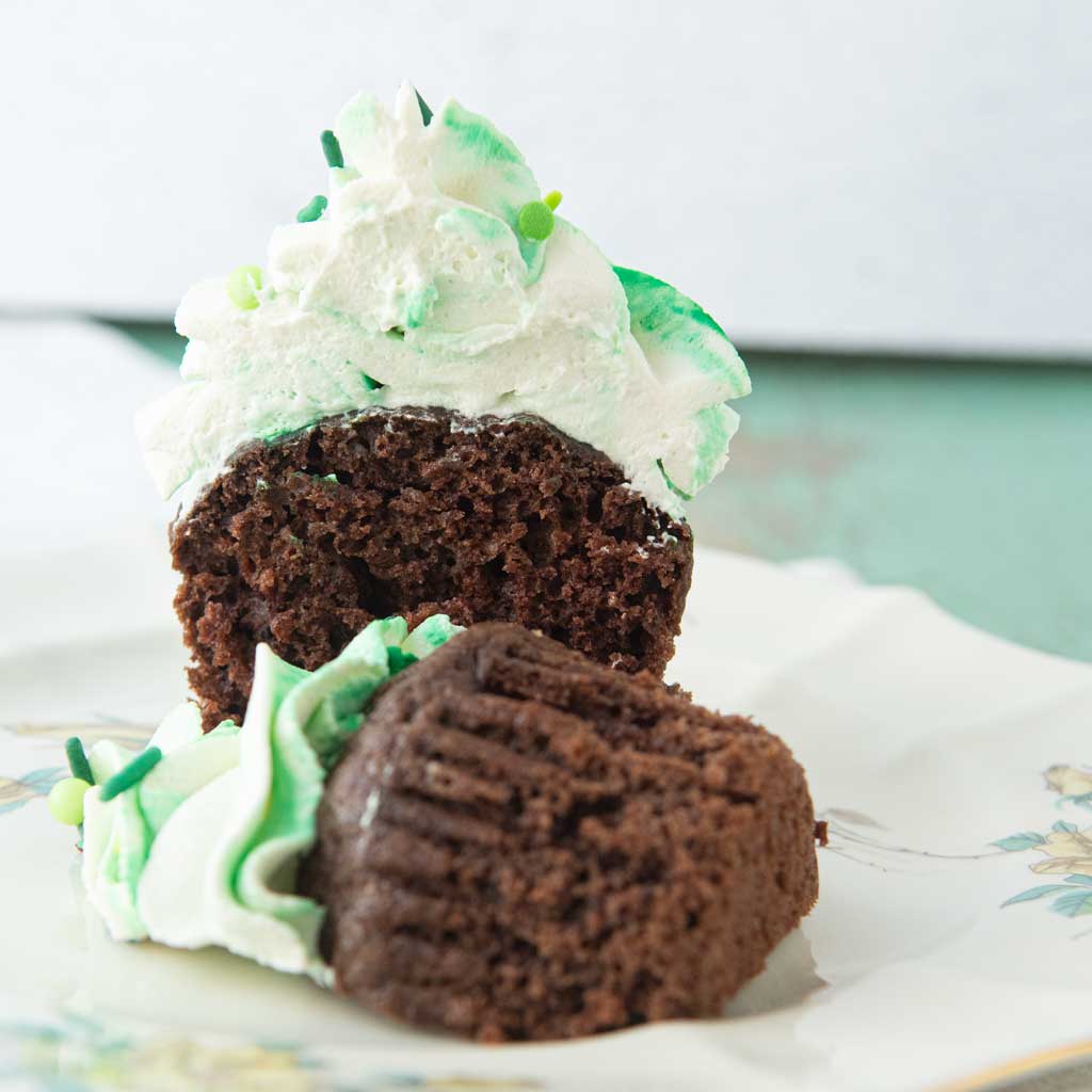 cross section of a guinness chocolate cupcake on plate