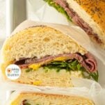 cross section of hoagie buns made into sandwiches, text overlay