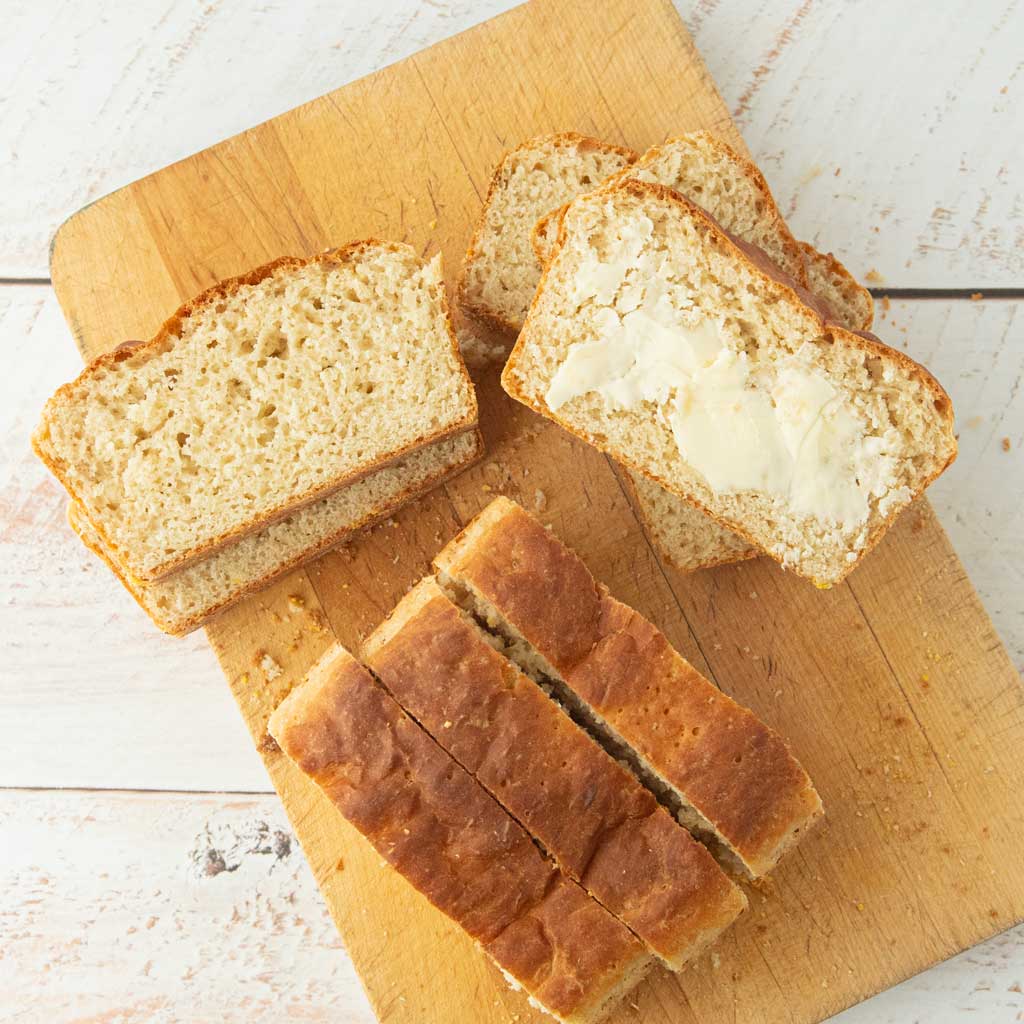 slices of English muffin bread on board