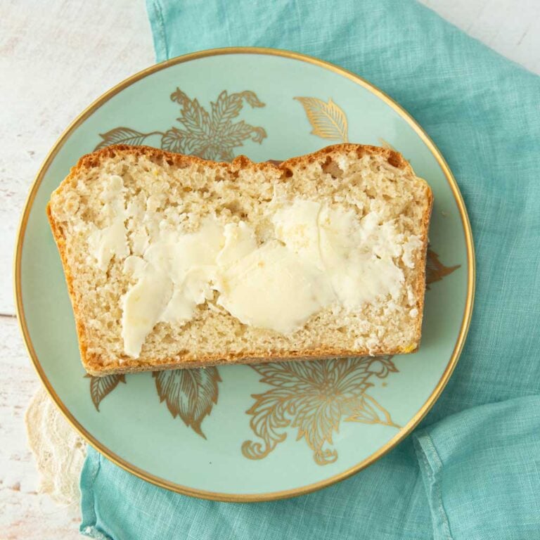 slice of English muffin bread with butter on it