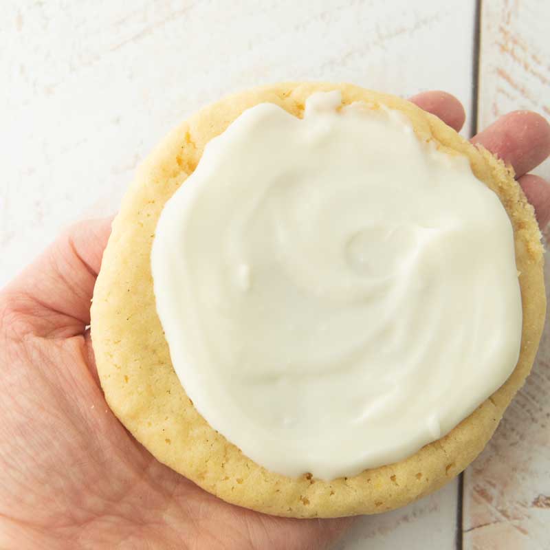 sugar cookie topped with cream cheese frosting