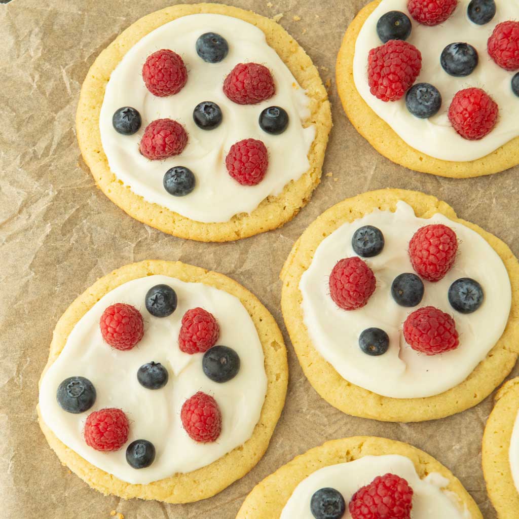 top view closeup of fruit pizza cookies topped with berries