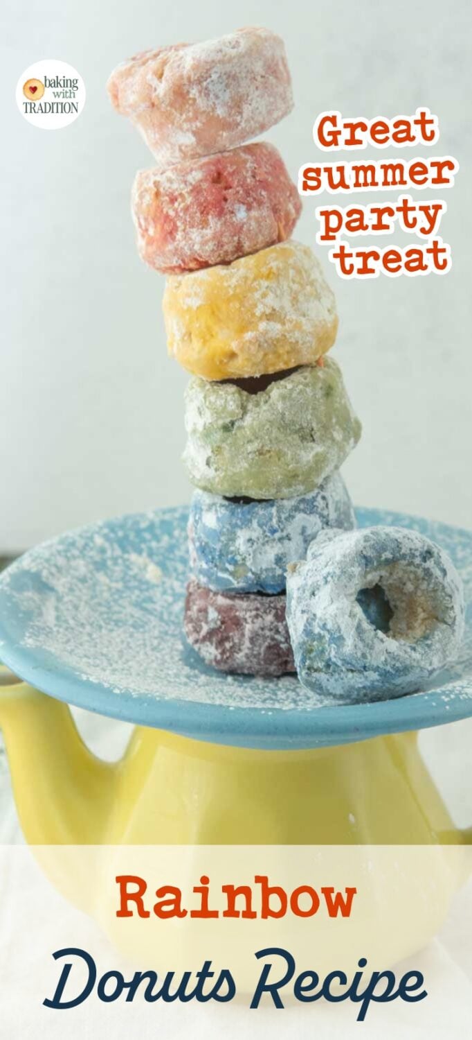 stack of rainbow cake donuts on plate on teapot, text overlay