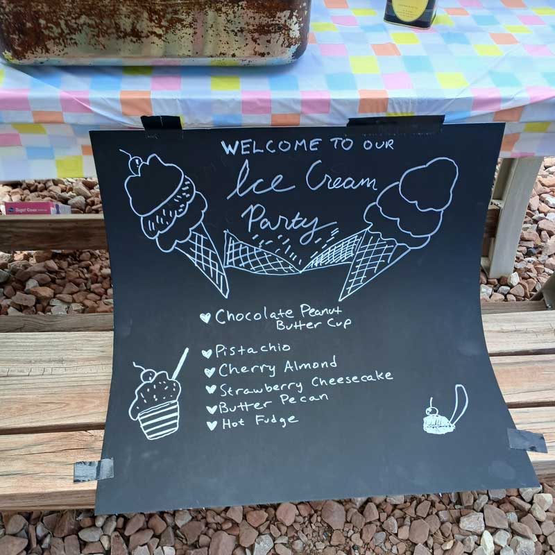 sign for ice cream party taped to table