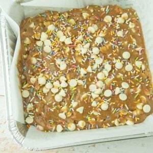 birthday cake blondies batter in pan