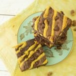 stack of pistachio brownies on plate
