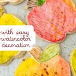 Pinterest graphic for Fall Apple Cookies featuring hand-painted watercolor sugar cookies decorated in red, yellow, and orange, with text reading 'Fall Apple Cookies with easy watercolor decoration