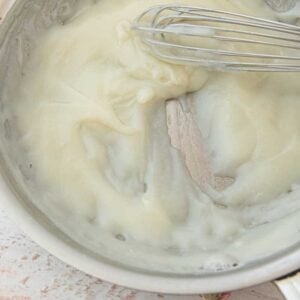 cooked roux for ermine frosting recipe and whisk in skillet