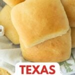 homemade texas roadhouse rolls in basket, text overlay