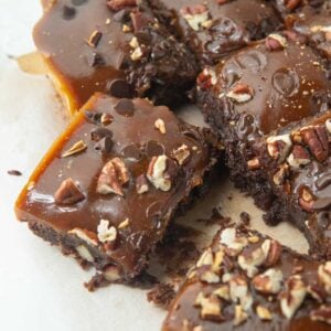 closeup of turtle brownies cut on board