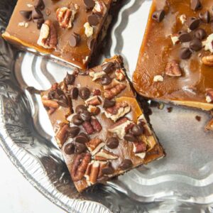 closeup of turtle brownies in foil pan