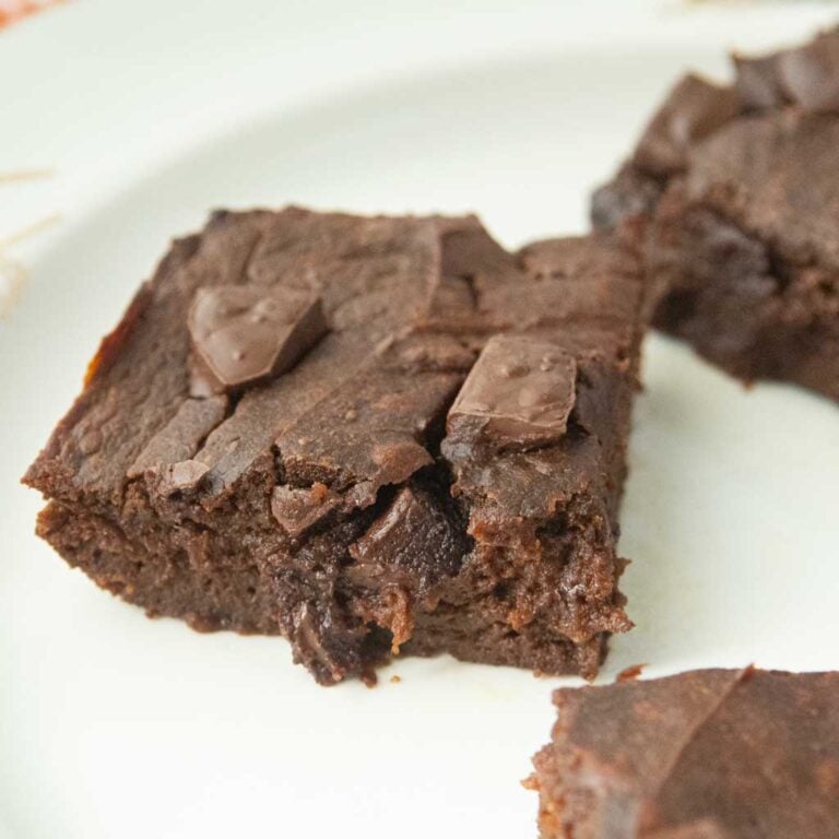 closeup of sweet potato brownie topped with chunks of chocolate