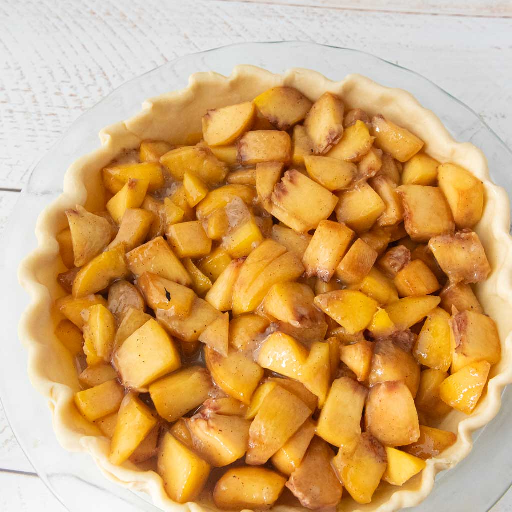 peach pie filling in pastry crust