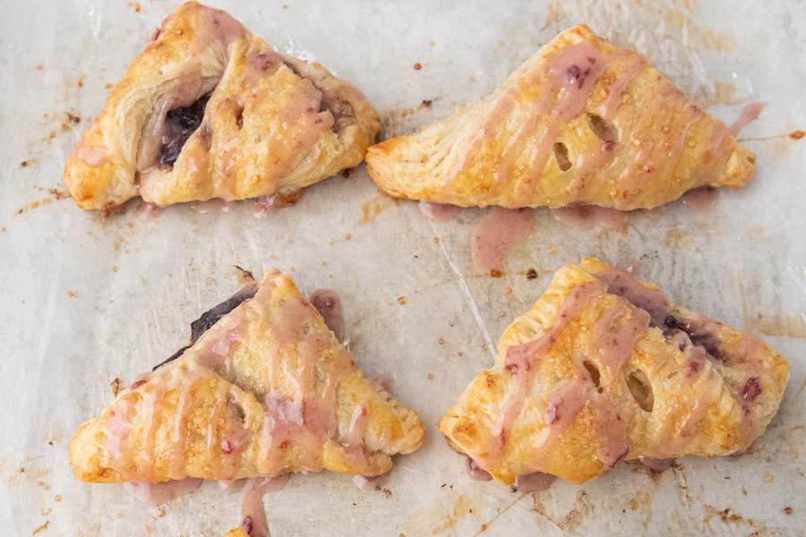 baked cherry turnovers with sour cherry glaze