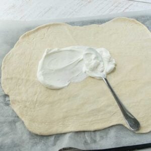 topping dough with sour cream for Flammkuchen