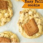 closeup of biscoff white chocolate cookies, text overlay