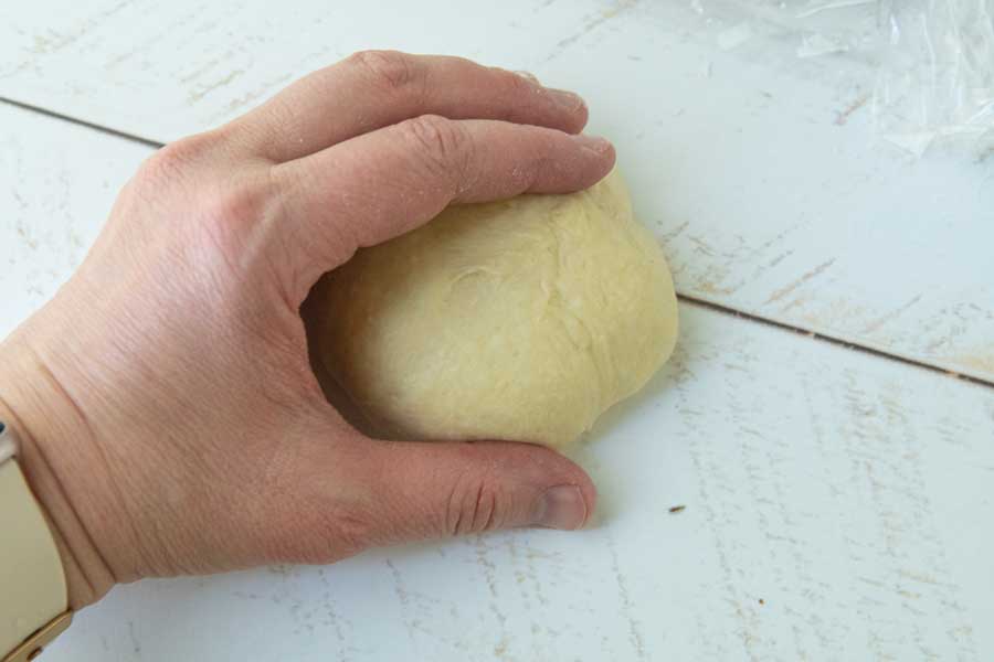hand shaping potato buns