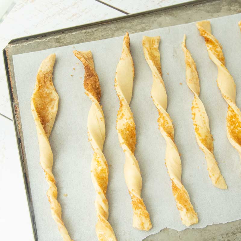 puff pastry cinnamon twists on baking sheet
