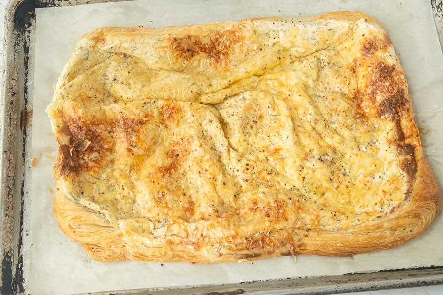 puff pastry garlic bread sheet on tray