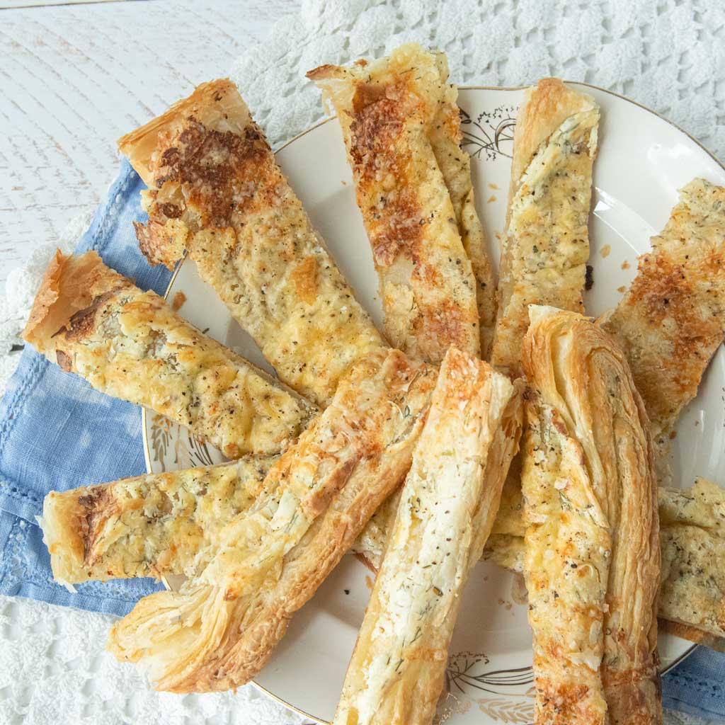 puff pastry garlic bread sticks on plate