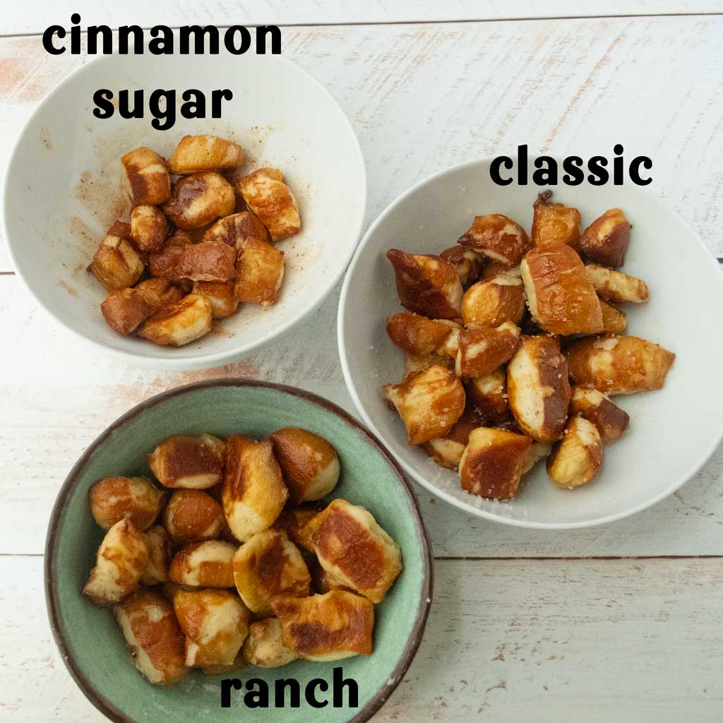 cinnamon sugar, classic and ranch flavored pretzel bites in bowls